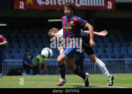 BARCELONA, Spanien - 23. Mai: Johnny spielt mit F.C Barcelona Jugendmannschaft gegen Valencia C.F. 2010. Stockfoto
