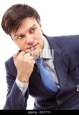 Porträt von nachdenklich Geschäftsmann mit Stift in der Hand, isoliert auf weiss Stockfoto