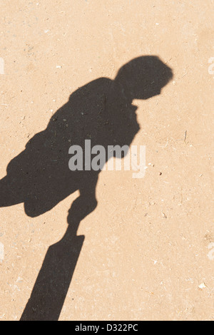 Schatten des jungen mit einem Cricket-Schläger. Indien Stockfoto