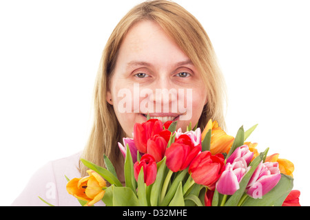 Frau mit Tulpen Stockfoto