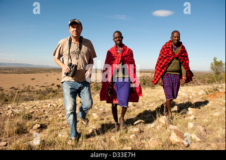 Walking-Safari mit Masai Guides, Masai Mara National Reserve, Kenia Stockfoto