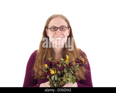 Frau mit getrockneten Rosen Stockfoto