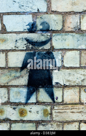 Graffiti auf eine Mauer lackiert. Stockfoto