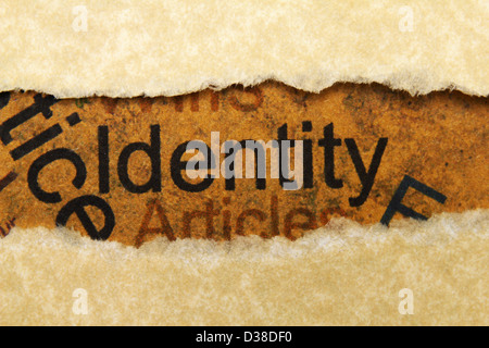 Identität-Text auf Grunge Papier Loch Stockfoto