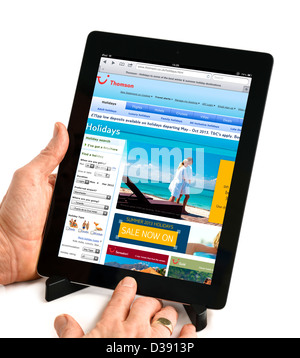 Die Thomson Holidays Website betrachtet auf eine 4. Generation Apple iPad Tablet-Computer, UK Stockfoto