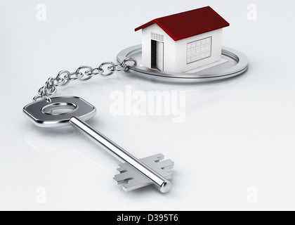 Modellhaus umgeben von Key Ring auf weißem Hintergrund Stockfoto