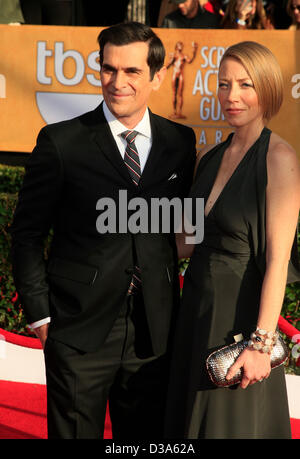 TY BURRELL & HOLLY BURRELL SCHAUSPIELER UND GAST 19. ANNUAL SCREEN ACTORS GUILD AWARDS. ROTEN Teppich LOS ANGELES, ENGLAND, UK 27. Januar 2013 DIO59163 Stockfoto