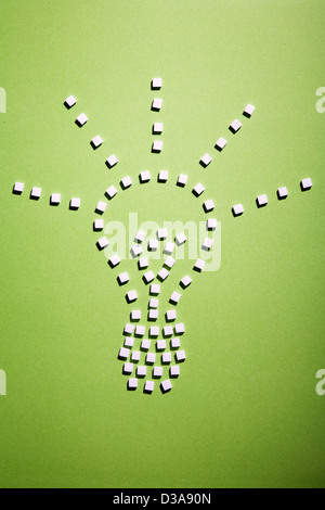 Würfelzucker in Form der Glühbirne Stockfoto