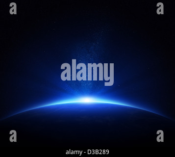 Erde - Sonnenaufgang im blauen Raum Stockfoto