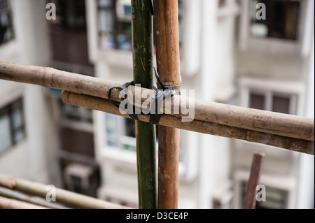 Bambus-Gerüst aufgebaut rund um das Kiu-Fett-Gebäude, noch für seine Haltbarkeit, Leichtigkeit und Flexibilität verwendet wird. Stockfoto