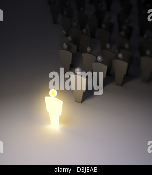 Eine leuchtende 3d Figur stehend aus der Menge. Stockfoto