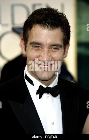 (Dpa) - britische Schauspieler Clive Owen lächelt, als er die 62. annual Golden Globe Awards in Beverly Hills, USA, 16. Januar 2005 besucht. Owen gewann den Award für seine Nebenrolle in dem Film "Closer". Stockfoto