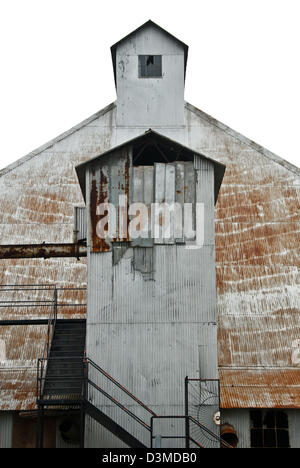 Das historische Monroe Cotton Gin-Lager in Monroe, Georgia, USA. Stockfoto