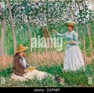 Claude Monet, In the Woods in Giverny: Blanche Hoschedé an ihrer Staffelei mit Suzanne Hoschedé Reading 1887 Öl auf Leinwand. Los Engel Stockfoto