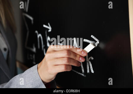 Lehrer zeichnen Zustand des Synchronismus phase Stockfoto