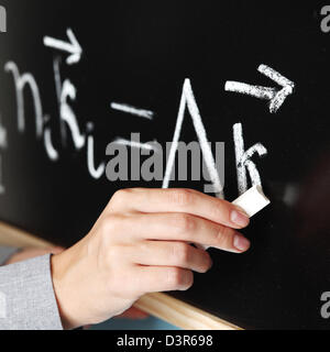 Lehrer zeichnen Zustand des Synchronismus phase Stockfoto