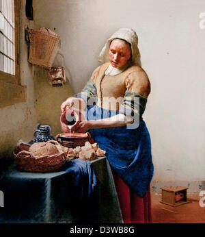 The Kitchen Maid Milkmaid - Het melk meisje (1658-1660) Johannes Jan Vermeer Dutch, Delft 1632–1675 Delft Netherlands Stockfoto