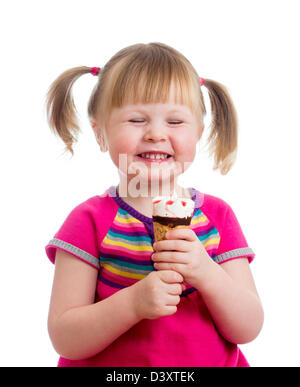 glückliches Kind Mädchen essen Eis im Studio isoliert Stockfoto