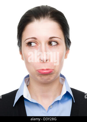 Porträt einer jungen Frau, die beim Blick zur Seite schmollend Stockfoto