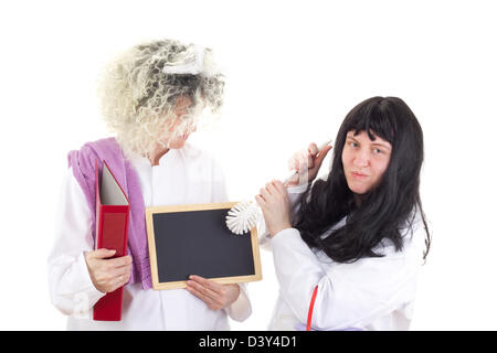 Weibliche Reinigungskräfte in weiß arbeiten Mäntel Stockfoto