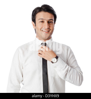 Porträt eines Geschäftsmannes, Krawatte anpassen Stockfoto