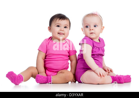 Lustige Babys Mädchen saß am Boden Stockfoto