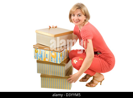 Die Frau in einem roten Kleid mit Boxen Stockfoto