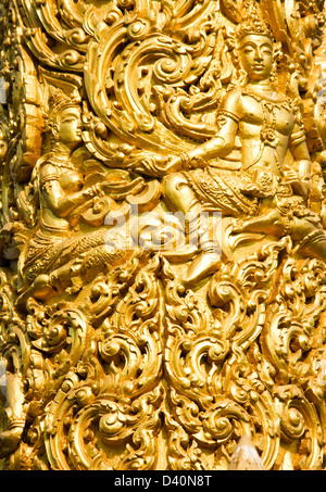 Nahaufnahme des goldenen Wachsfigur bei Tung Sri Muang Park in der Provinz Ubon Ratchathani, Thailand Stockfoto