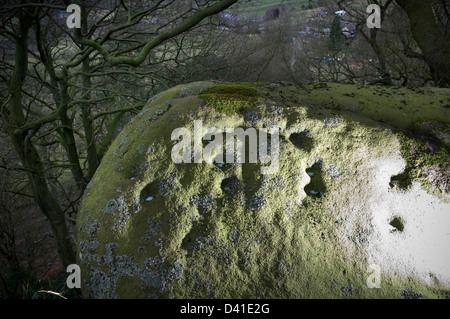 Prähistorische Felszeichnungen auf Rowtor Felsen, Birchover, Derbyshire, UK Stockfoto