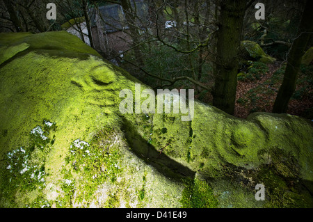 Prähistorische Felszeichnungen auf Rowtor Felsen, Birchover, Derbyshire, UK Stockfoto