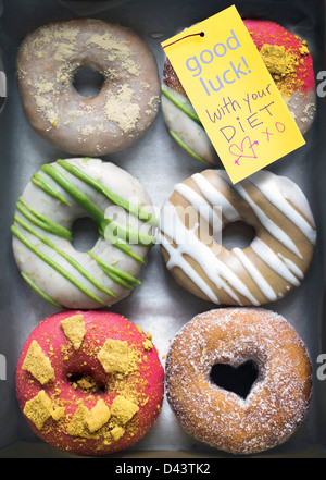 Designer Donuts mit Hinweis Stockfoto