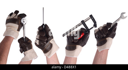 Hände mit verschiedenen Werkzeugen in Handschuhe Stockfoto