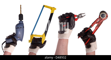 Hände mit verschiedenen Werkzeugen in Handschuhe Stockfoto