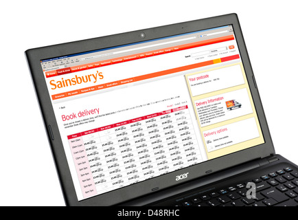 Buchen Sie eine Hauszustellung online Sainsbury's shopping-Website, UK Stockfoto