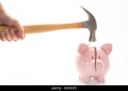 Hammer-brechen-Sparschwein Stockfoto