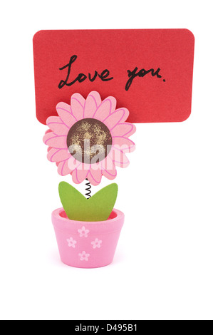 Liebe dich Worte geschrieben auf rotem Papier Sonne Blume Topf Clips Stockfoto