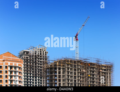 Arbeiten Sie auf einer Baustelle. Industrie-Bau... Stockfoto