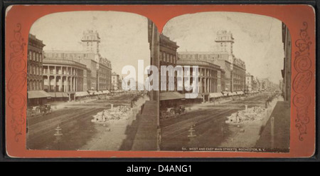 Dieses Foto aus dem Jahr 1882 zeigt einen Blick auf die West- und East Main Street in Rochester, New York, und zeigt die Straßen und Gebäude der Stadt im späten 19. Jahrhundert. Stockfoto