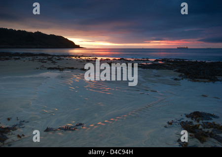 Sunrise Beach Falmouth Cornwall sand rosa Himmel Meer Stockfoto