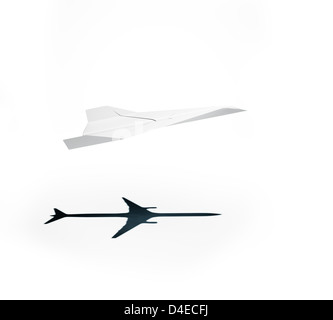 Papierflieger wirft einen Schatten ein Düsenflugzeug - Vision und Ziele Konzept Abbildung Stockfoto