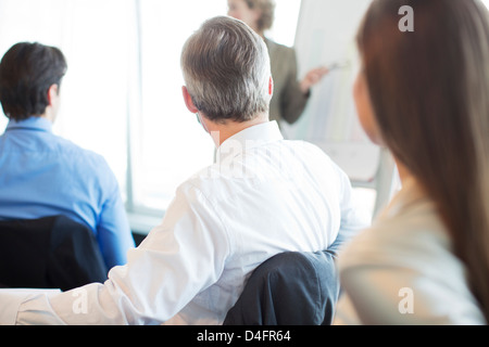 Business-Leute sitzen in treffen Stockfoto