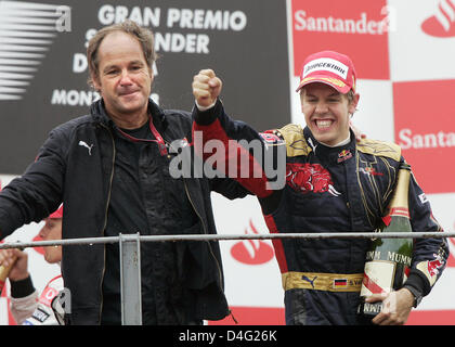 Deutsche Formel1-Fahrer Sebastian Vettel von Scuderia Toro Rosso-Ferrari (R) und Torro Rosso Mitinhaber österreichischen Gerhard Berger (L) feiern den Formel 1 Grand Prix von Italien auf Autodromo Nazionale di Monza-Rennstrecke in Monza, Italien, 14. September 2008 zu gewinnen. Foto: Felix Heyder Stockfoto