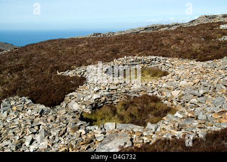 Eisen Sie alter Häuser, Tre'r Ceiri, Wallburg, Yr eIFL.NET Berge, Lleyn-Halbinsel, Gwynedd, Nordwales. Stockfoto