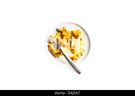 Risotto mit Kürbis und Parmigiano Reggiano, garniert mit gebratenem Salbei und Amaretti Krümel. Stockfoto