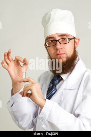 Closeup Portrait Arzt isoliert auf einem grauen Hintergrund Stockfoto
