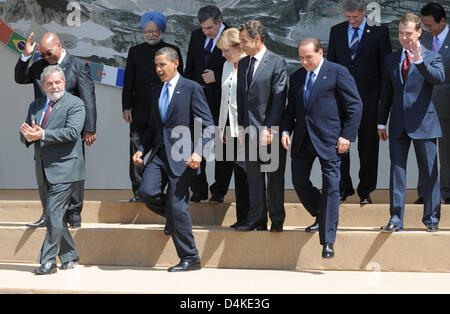 (L-R) Brasilianische Präsident Luiz Inacio Lula da Silva, Südafrikas Präsident Jacob Zuma, indische Premierminister Manmohan Singh, US-Präsident Barack Obama, der britische Premierminister Gordon Brown, Bundeskanzlerin Angela Merkel, Frankreichs Präsident Nicolas Sarkozy, italienische Ministerpräsident Silvio Berlusconi, der kanadische Premierminister Stephen Harper und der russische Präsident Dmitri Medvedev verlassen t Stockfoto