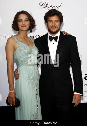 Französischen Schauspieler Guillaume Canet und Marion Cotillard besuchen das AmfAR-Kino gegen Aids-Gala bei den 62. Filmfestspielen in Cannes, Frankreich, 21. Mai 2009. Foto: Hubert Boesl Stockfoto