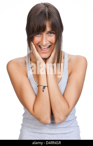 Ausschnitt lachender Junge Frau mit langen braunen Haaren schauen überrascht, beide Hände auf ihr Gesicht Stockfoto