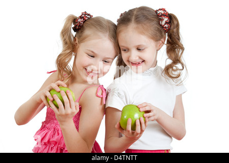 zwei Mädchen mit grünem Apfel gesund essen Stockfoto