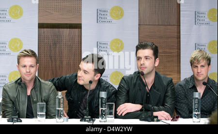 Nick Byrne (L-R), Shane Filan und Mark Feehily Kian Egan der Boyband Westlife gesehen während einer Pressekonferenz in Oslo, Norwegen, 11. Dezember 2009 vor der Nobel Peace Prize Concert in Oslo Spektrum am 11. Dezember 2009. Das Konzert ist zu Ehren der Friedensnobelpreisträger uns Präsident Obama statt. Foto: Albert Nieboer (Niederlande) Stockfoto